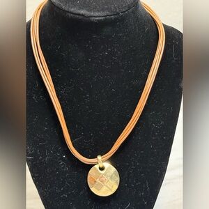 Brown leather strap gold pendant necklace